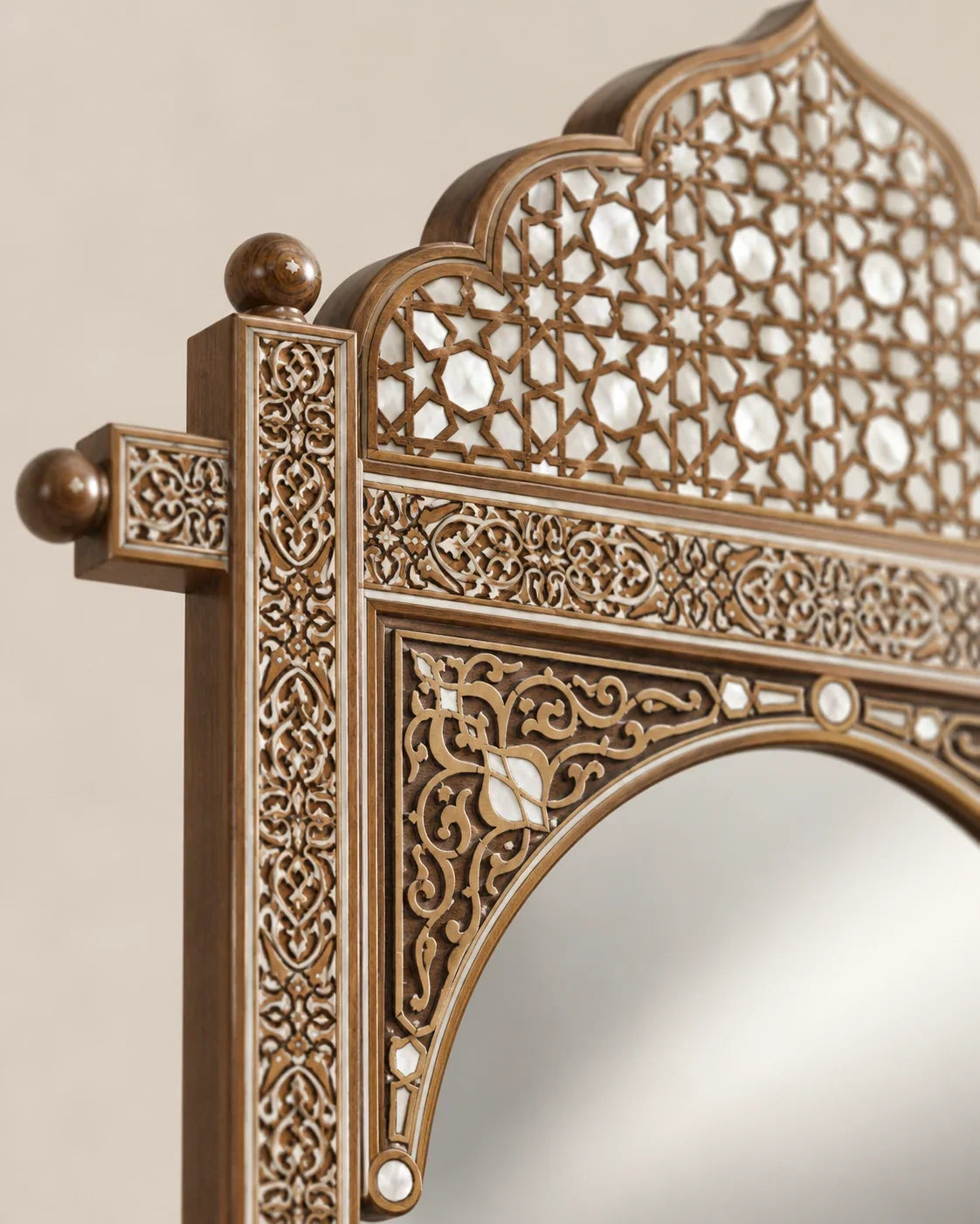 Carved crown wall mirror with mother-of-pearl lattice inlay