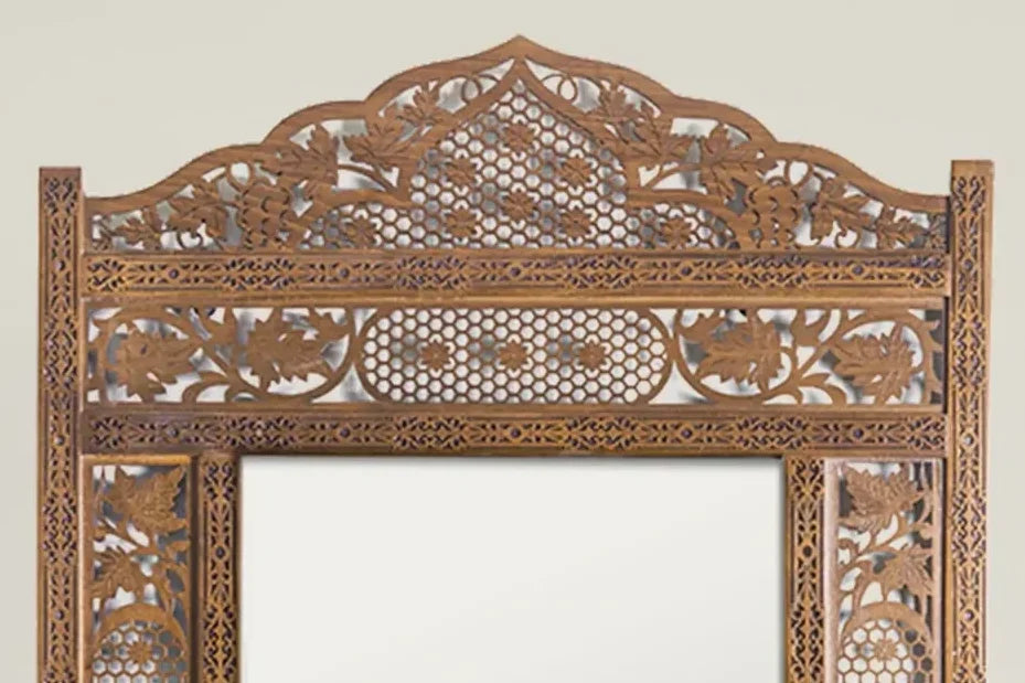 Debora tall carved crown mirror – close-up of the hand-carved crown