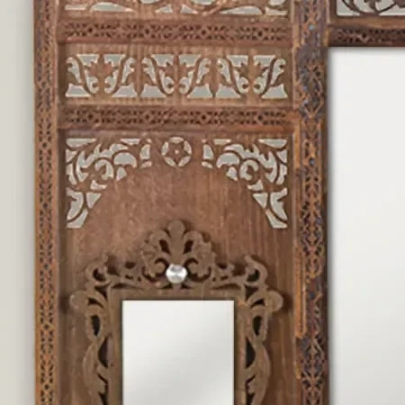 Tarquin Grande carved mirror with shelves – frame corner detail showing carving